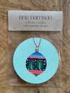 Set of Four Reversible Brie Harrison Christmas Drinks Coasters - Bauble