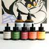 Set of Pepin skincare products with colorful labels against a decorative wall.